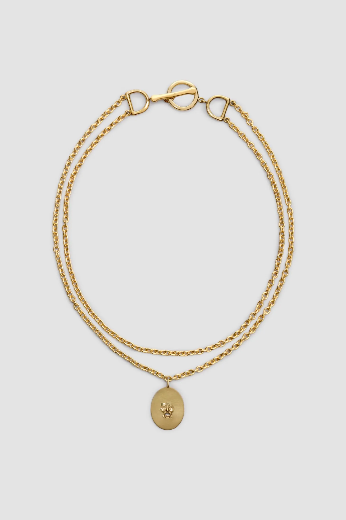 Bocca-Halskette mit Charm aus vergoldetem Messing