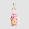 Ikonischer Bucket Charm aus Raffiabast