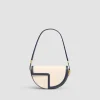Le Patou Tasche aus Leder und Canvas