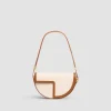 Le Patou Tasche aus Leder und Canvas
