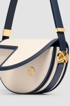 Le Patou Tasche aus Leder und Canvas